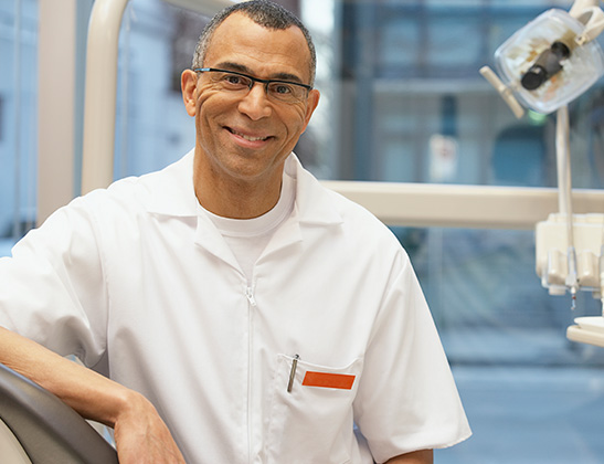 smiling doctor with glasses