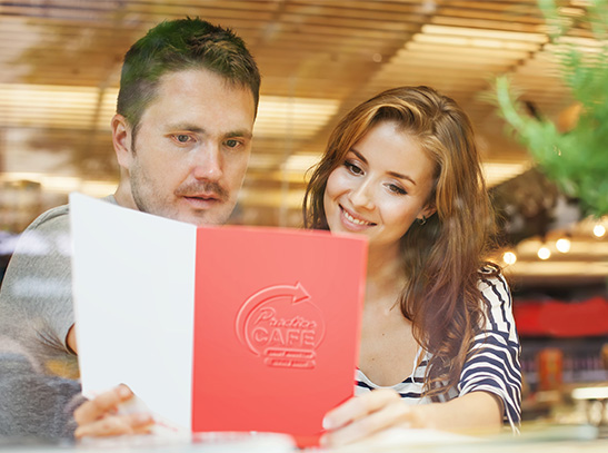 Couple looking at menu