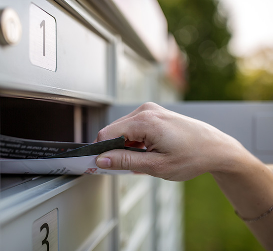 A person getting their mail