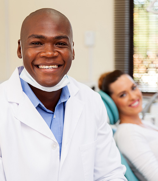 Doctor and patient smiling