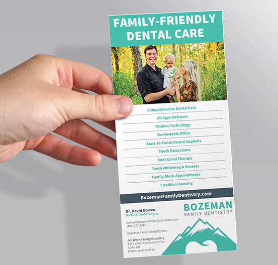 Hand holding brochure