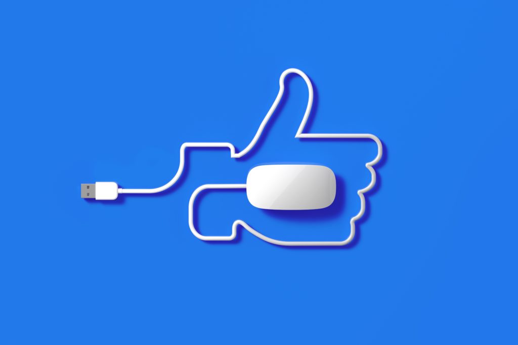 Computer mouse forming Facebook thumbs up