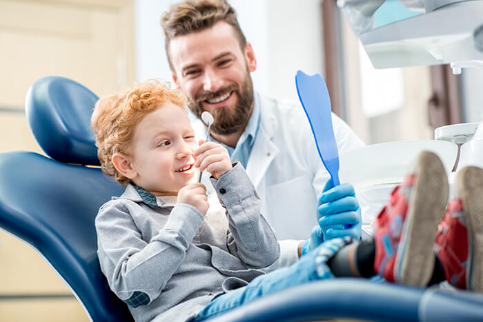 young patient and dentist