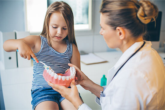 dentist with a young patient